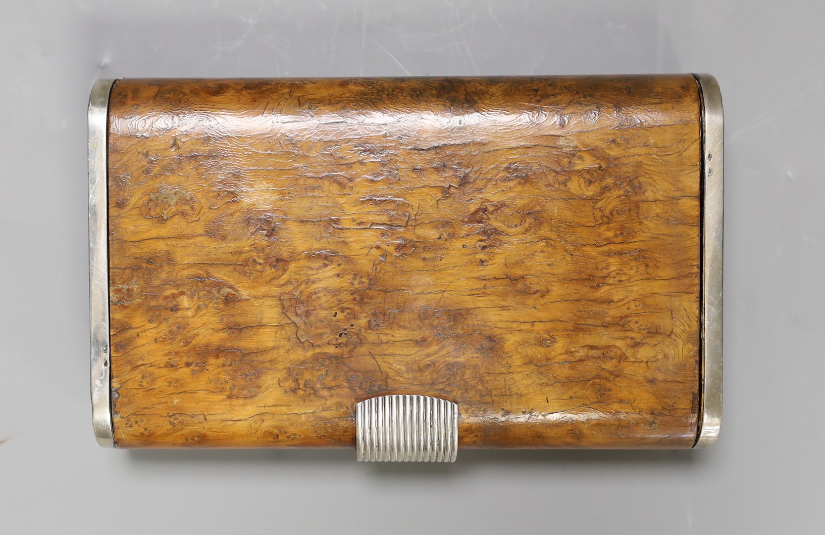 A Zendrini of Torino Art Deco style 800 standard white metal mounted burr yew cigar case.